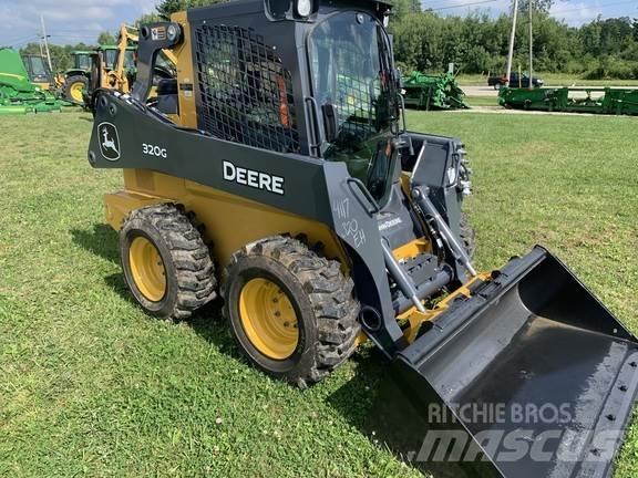 John Deere 320G لوادر انزلاقية التوجيه