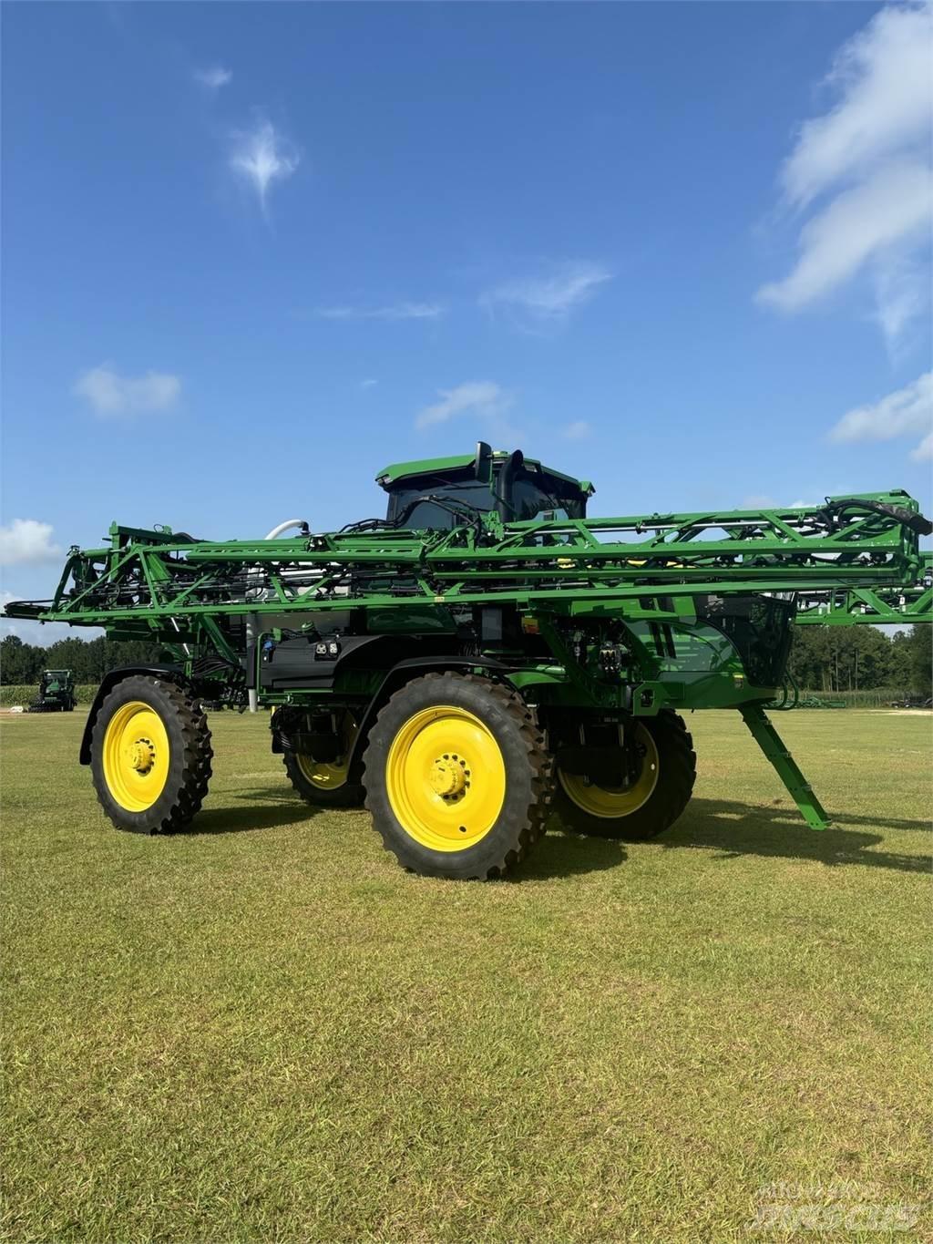 John Deere 410R الرشاشات