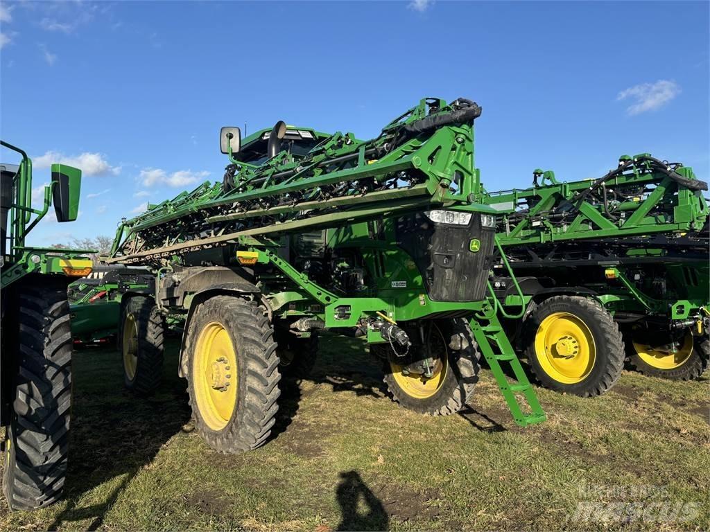 John Deere 412R الرشاشات