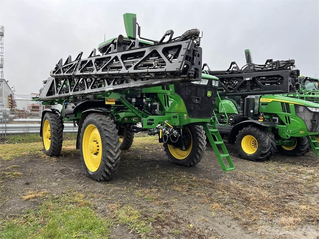 John Deere 412R الرشاشات