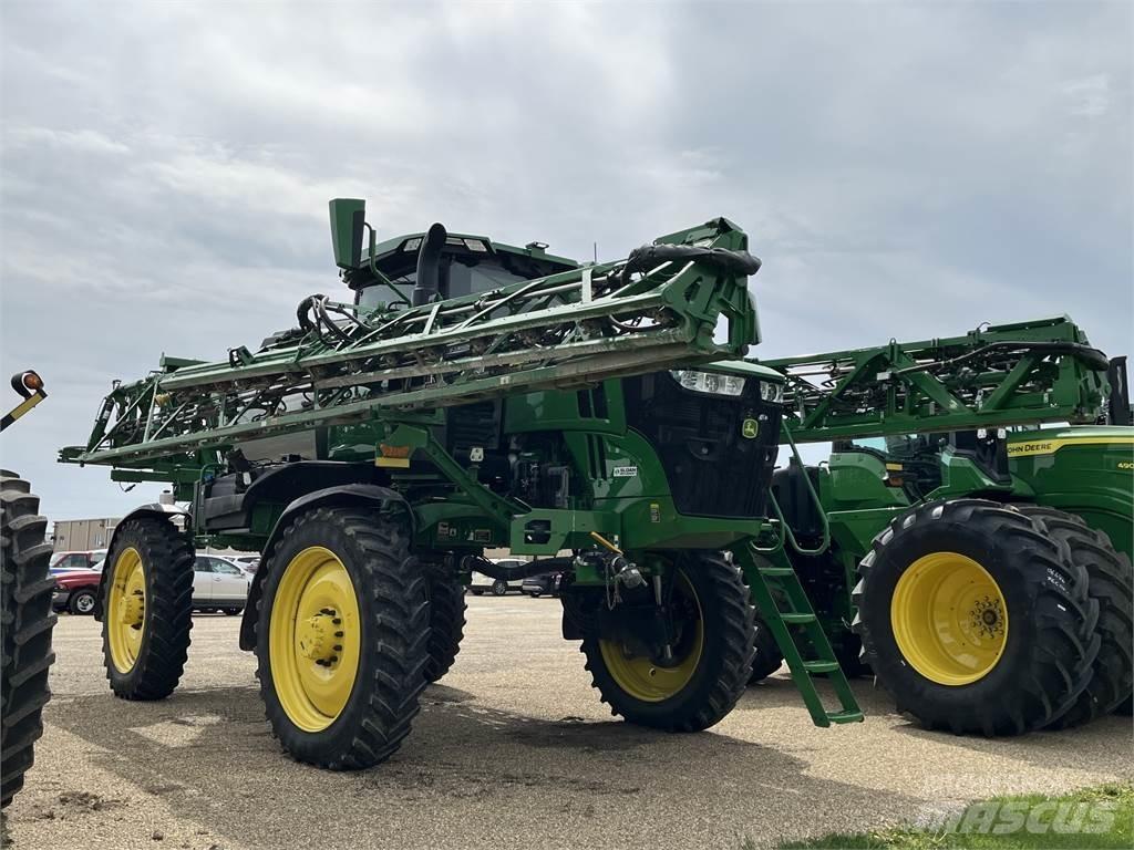 John Deere 412R الرشاشات