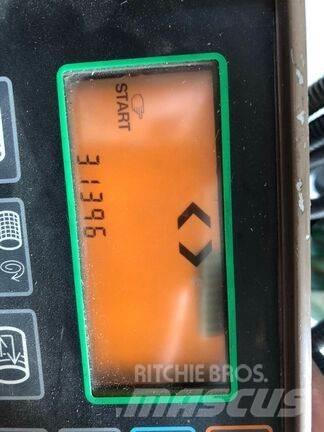 John Deere 590 محزمات مستديرة