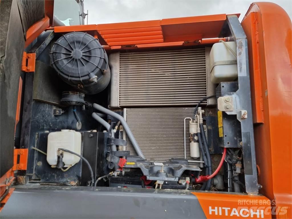 Hitachi ZX140W-3 حفارات بعجل