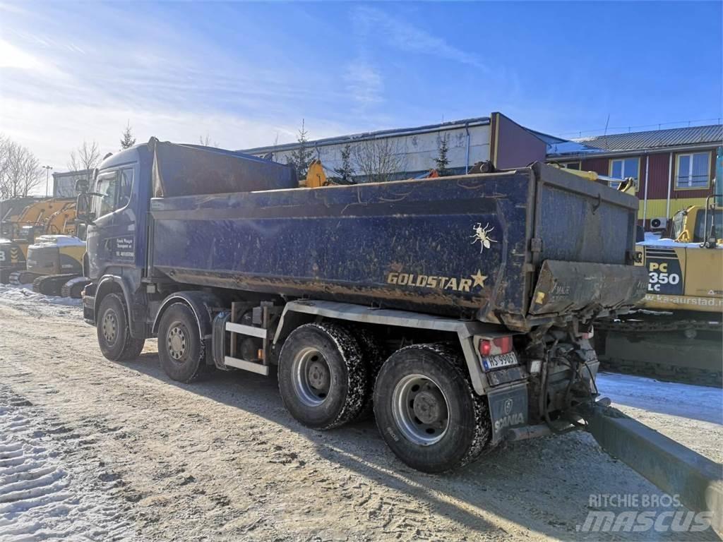Scania R560 8x4 شاحنات لوادر