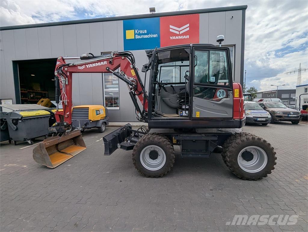 Yanmar B 75 W حفارات بعجل