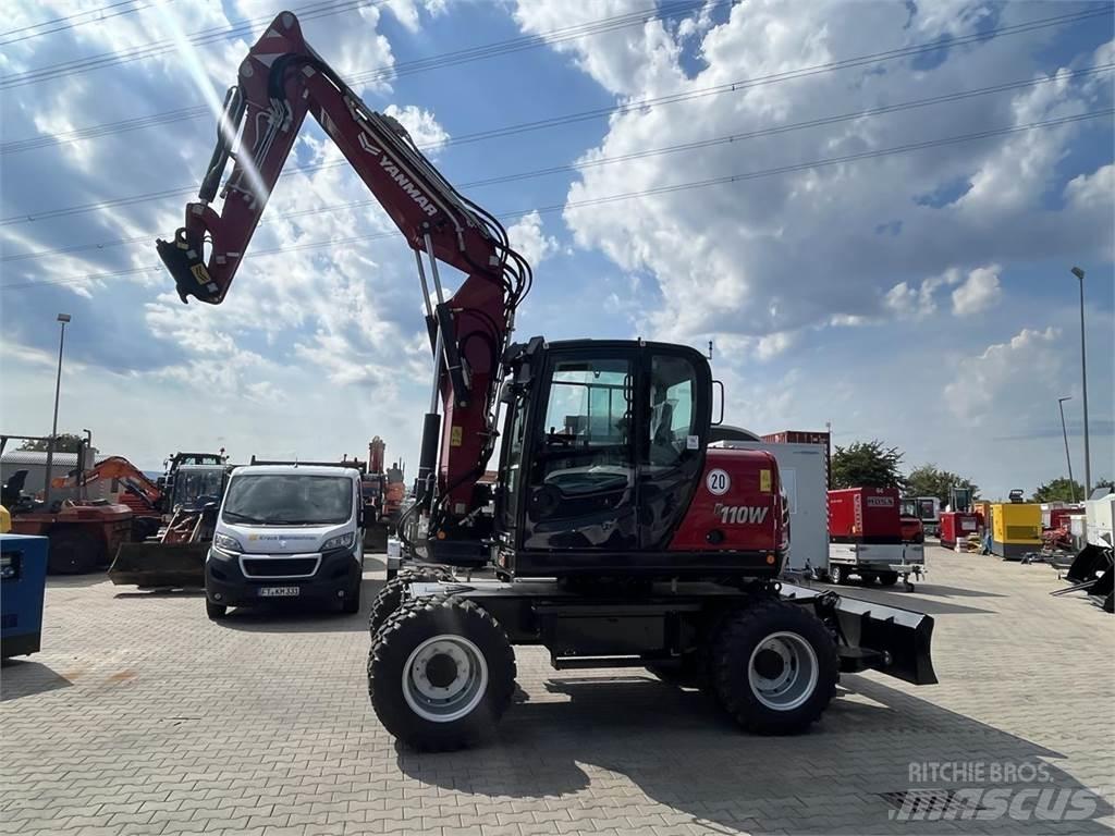 Yanmar B110W حفارات بعجل