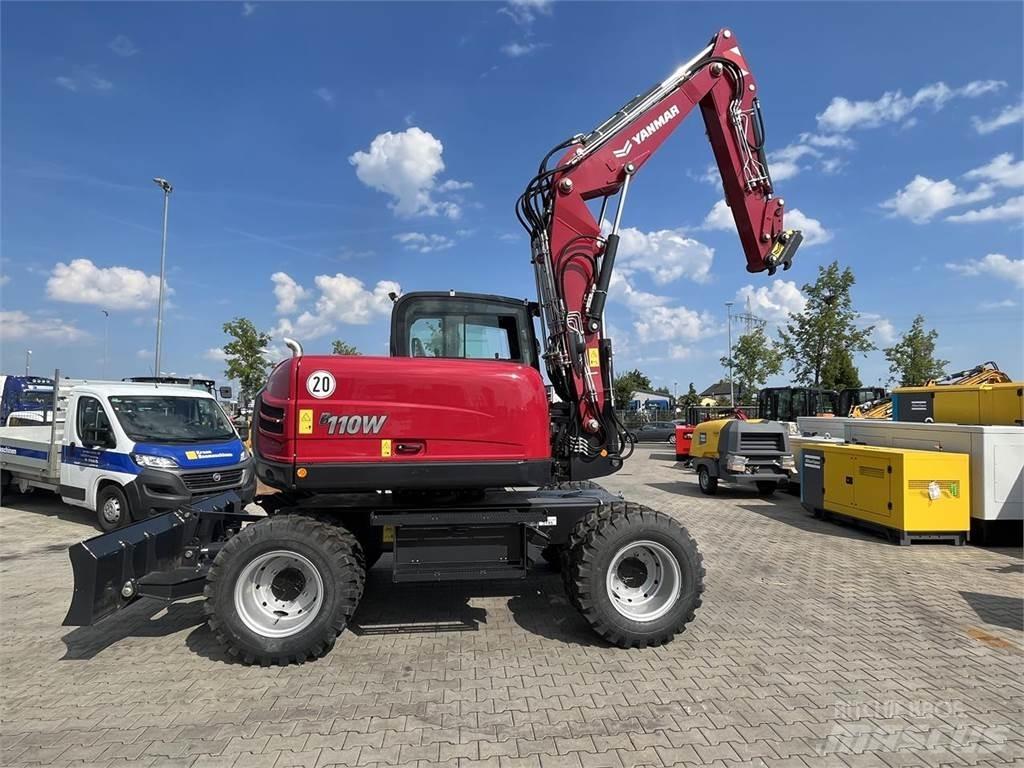 Yanmar B110W حفارات بعجل