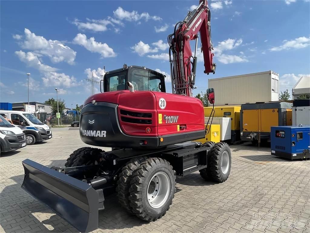 Yanmar B110W حفارات بعجل