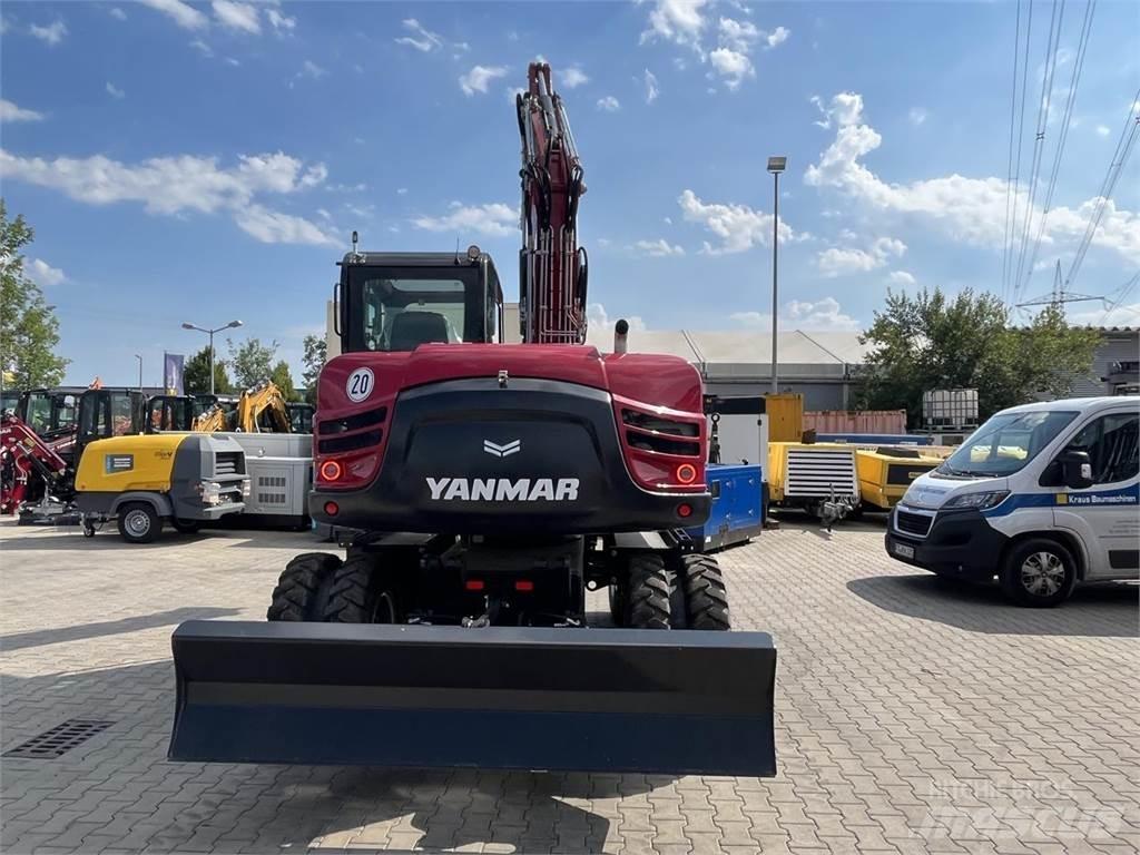 Yanmar B110W حفارات بعجل