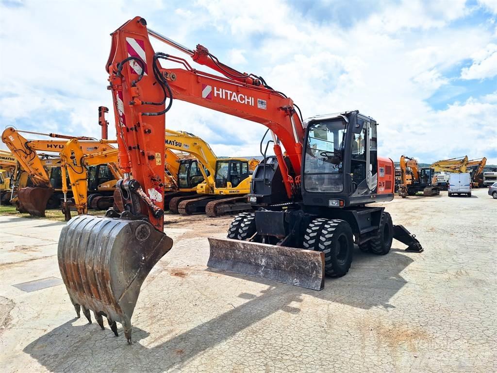 Hitachi ZX140W-3 حفارات بعجل