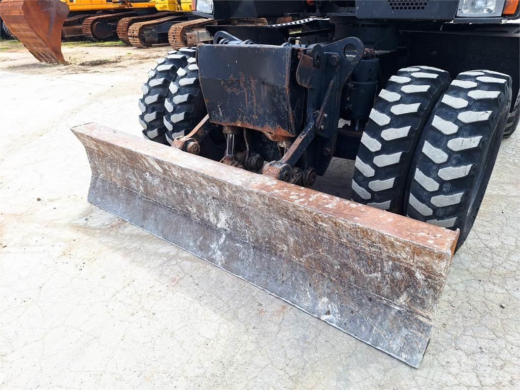 Hitachi ZX140W-3 حفارات بعجل