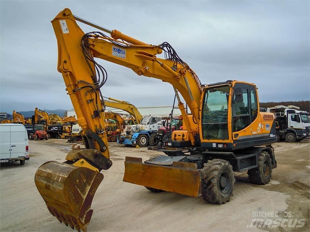 Hyundai R140W-9 حفارات بعجل