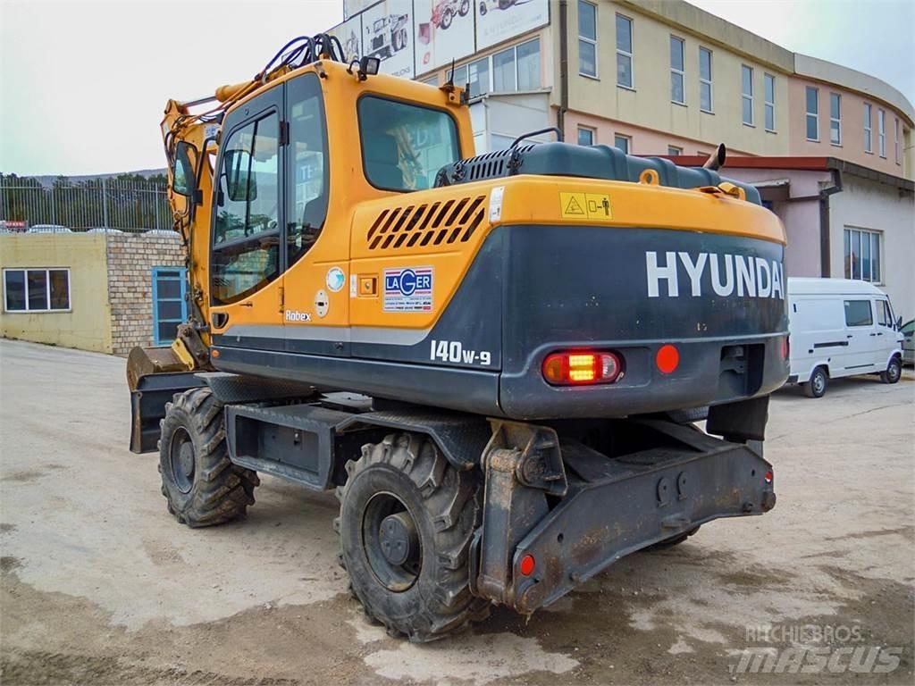 Hyundai R140W-9 حفارات بعجل