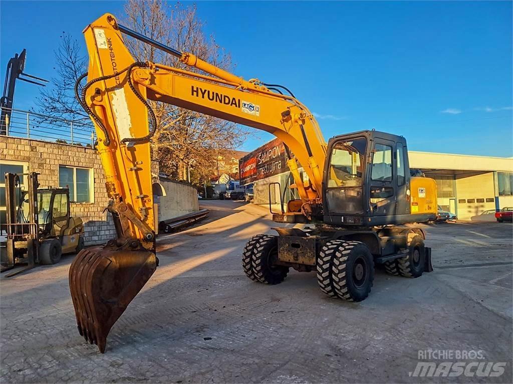 Hyundai R170W-7A حفارات بعجل