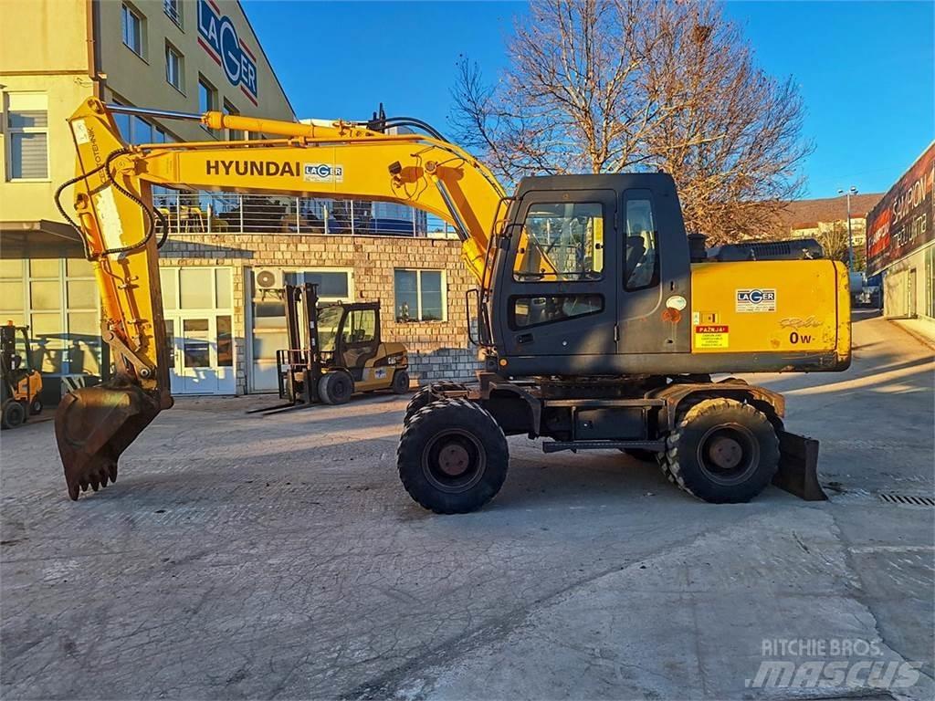 Hyundai R170W-7A حفارات بعجل