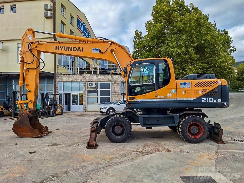 Hyundai R210W-9 حفارات بعجل