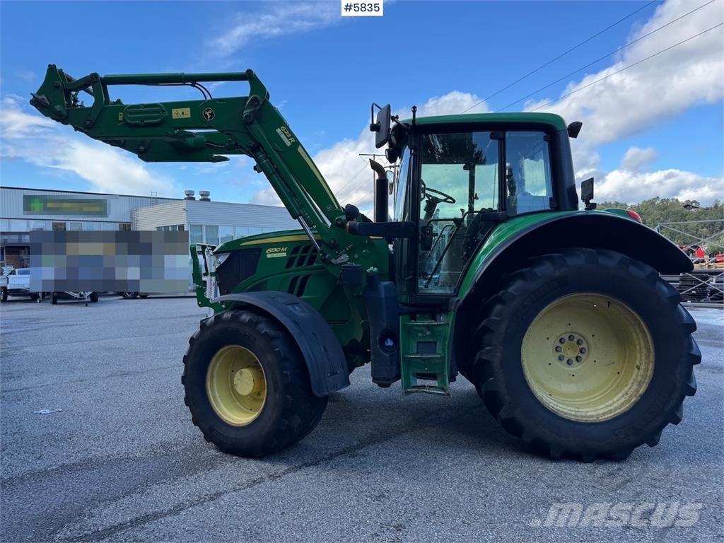 John Deere 6130M الجرارات