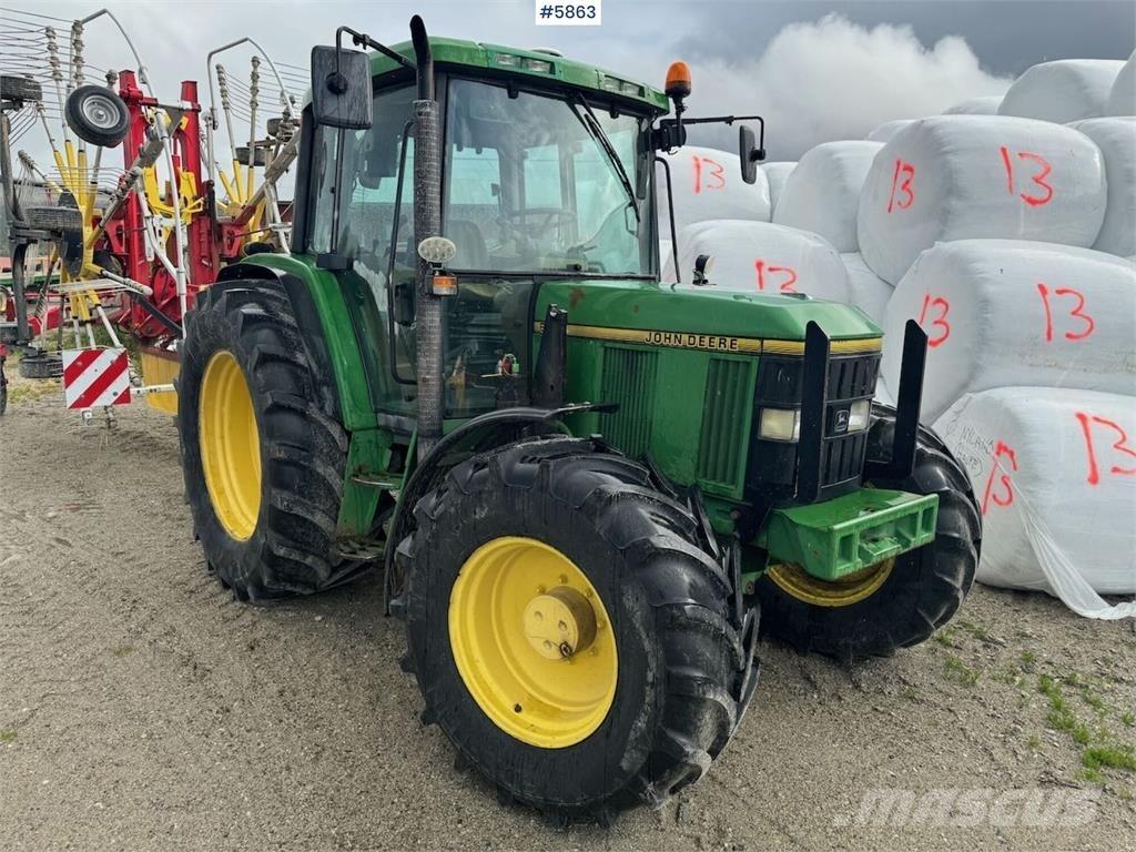John Deere 6400 الجرارات