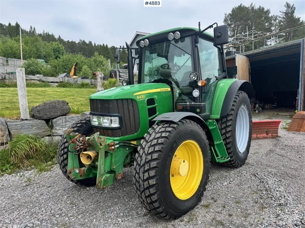 John Deere 6430 الجرارات