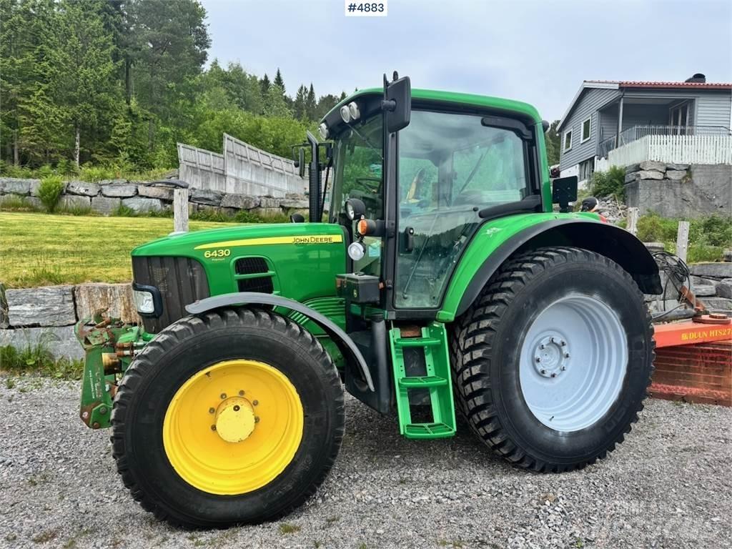 John Deere 6430 الجرارات