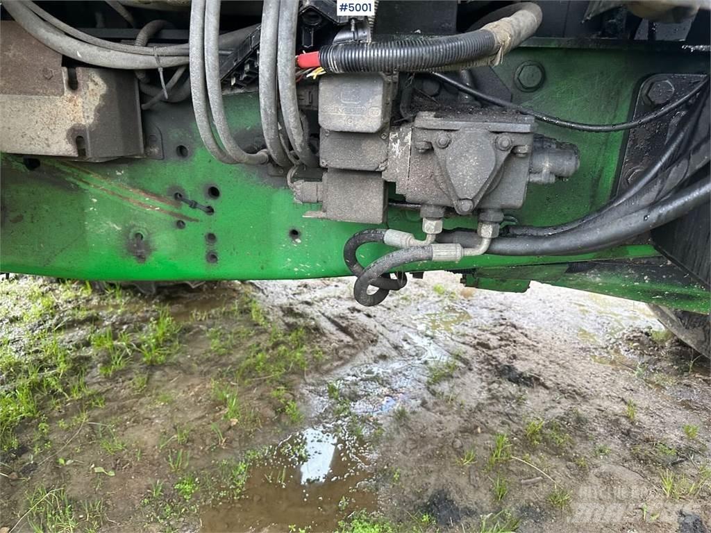 John Deere 6610 الجرارات