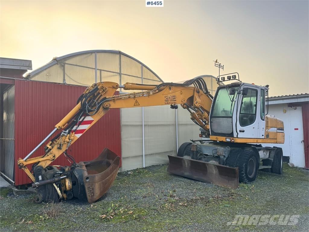 Liebherr 312 حفارات زحافة