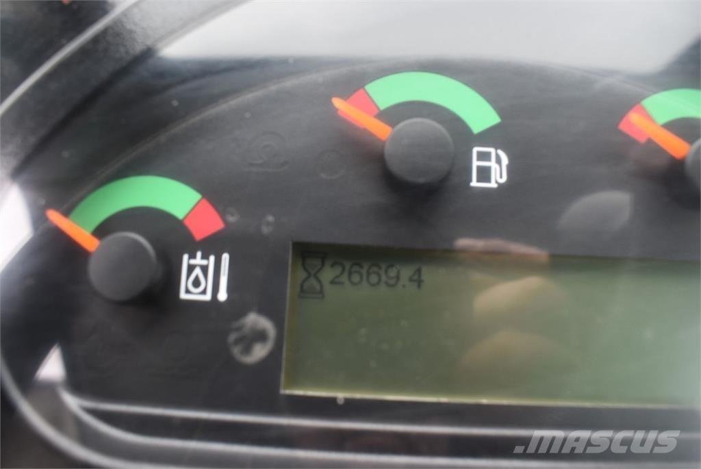 CAT 906M لوادر بعجل