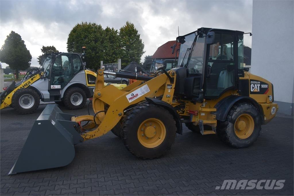 CAT 908M لوادر بعجل