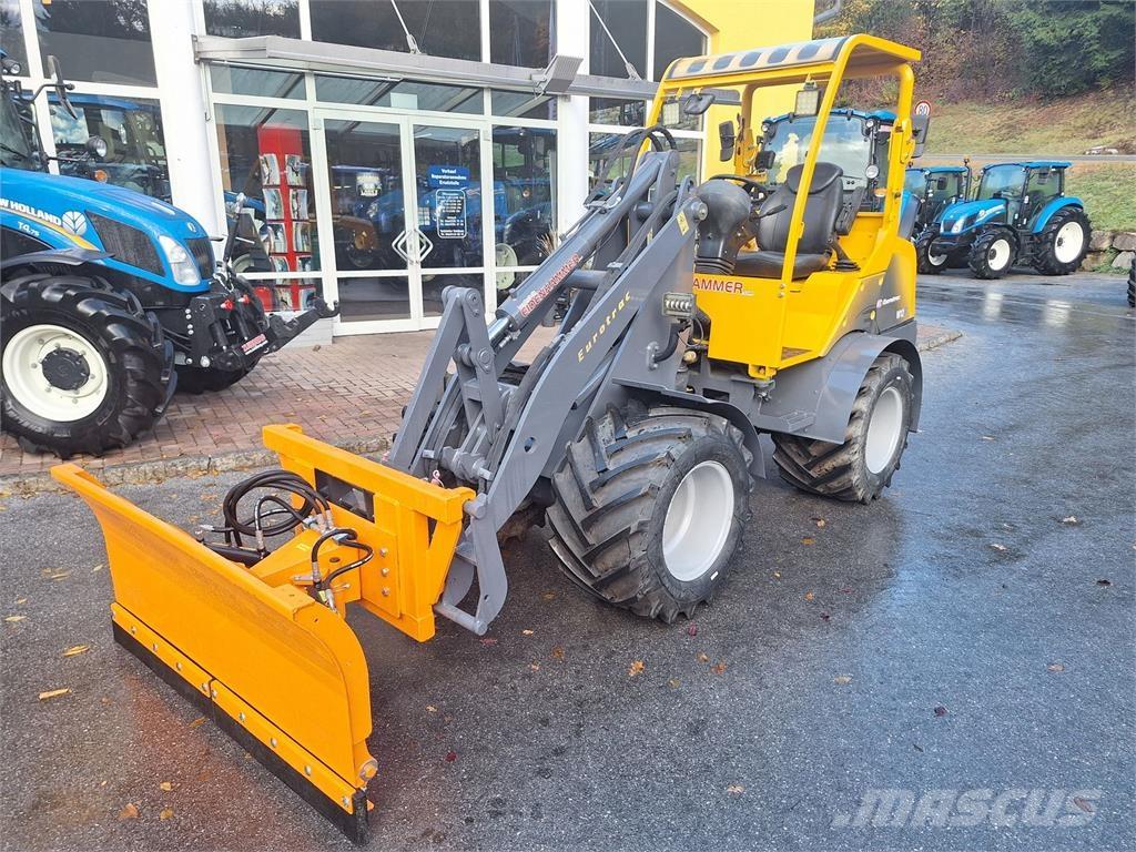 Eurotrac W12 F لوادر وحفارات أمامية