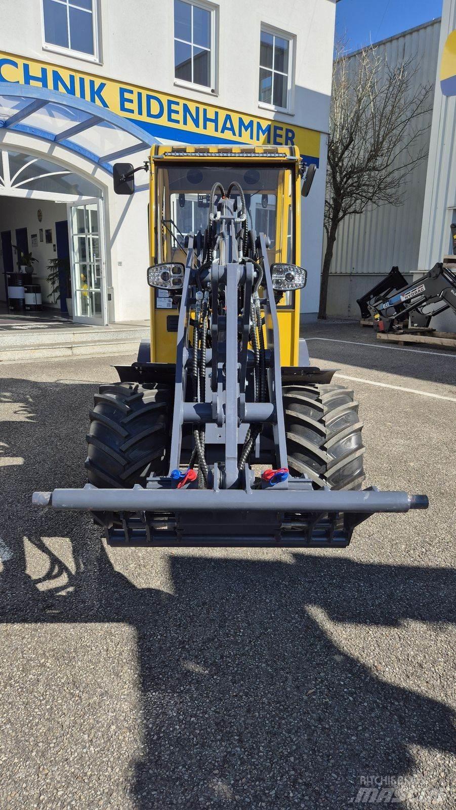 Eurotrac W12 s لوادر وحفارات أمامية