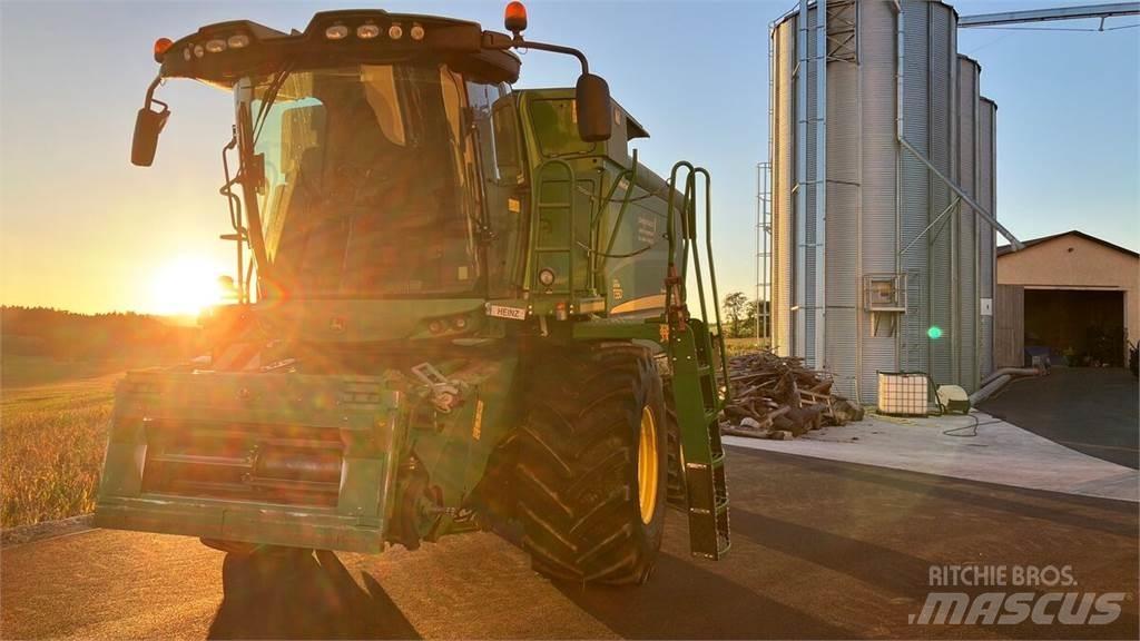 John Deere T550 HM حصادات