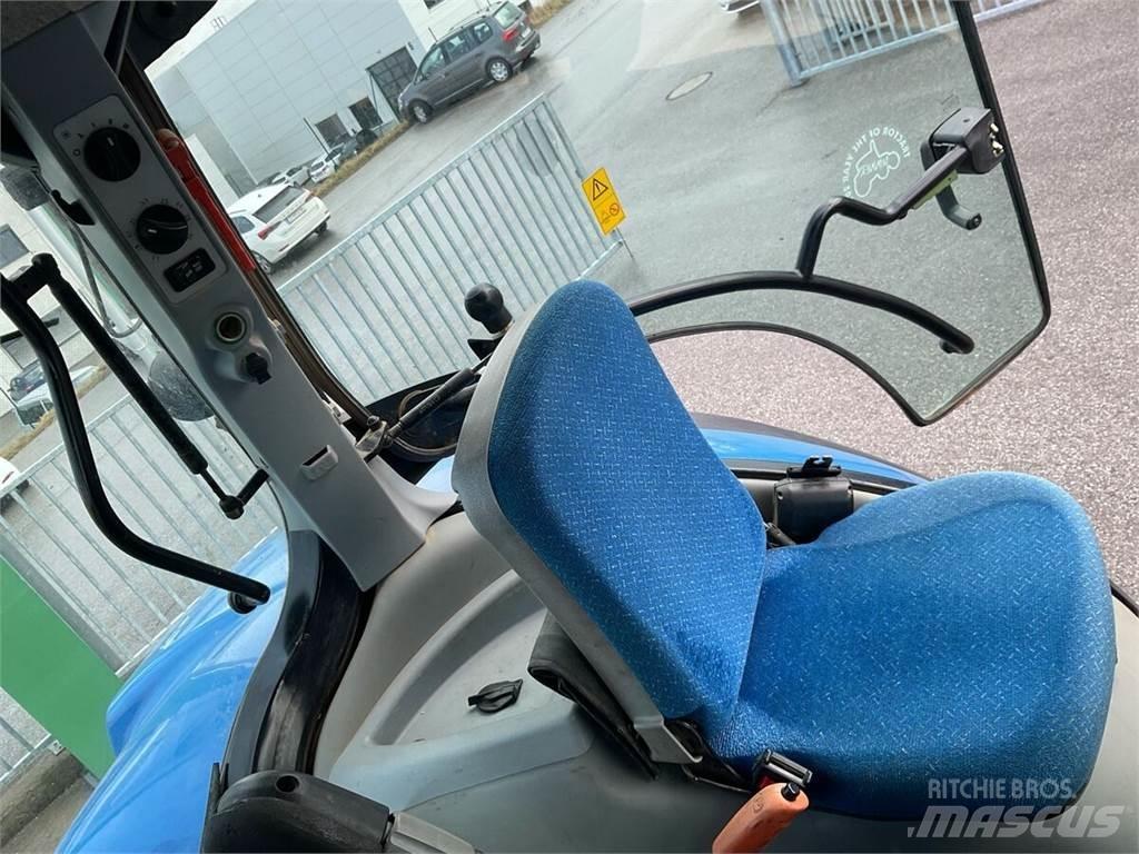 New Holland T7050 الجرارات