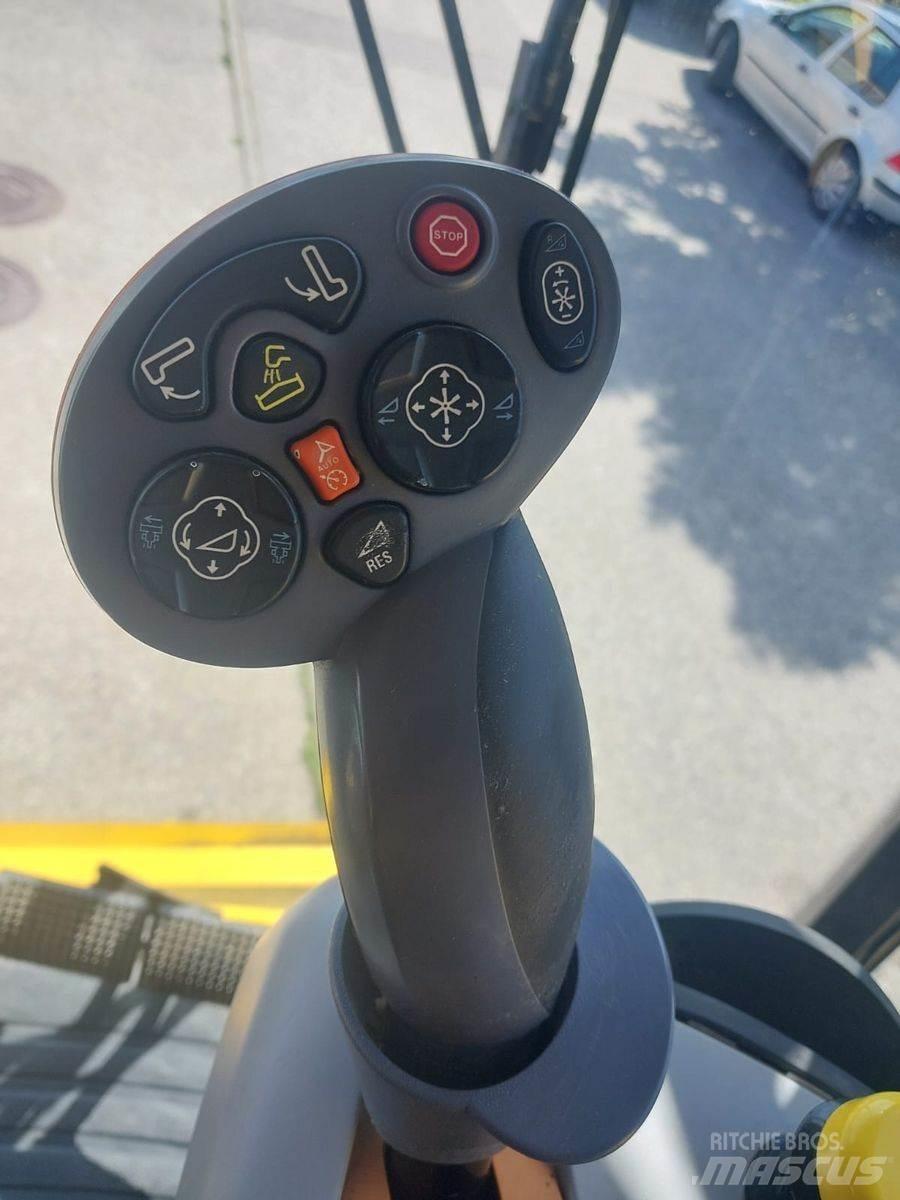 New Holland TC5070 حصادات