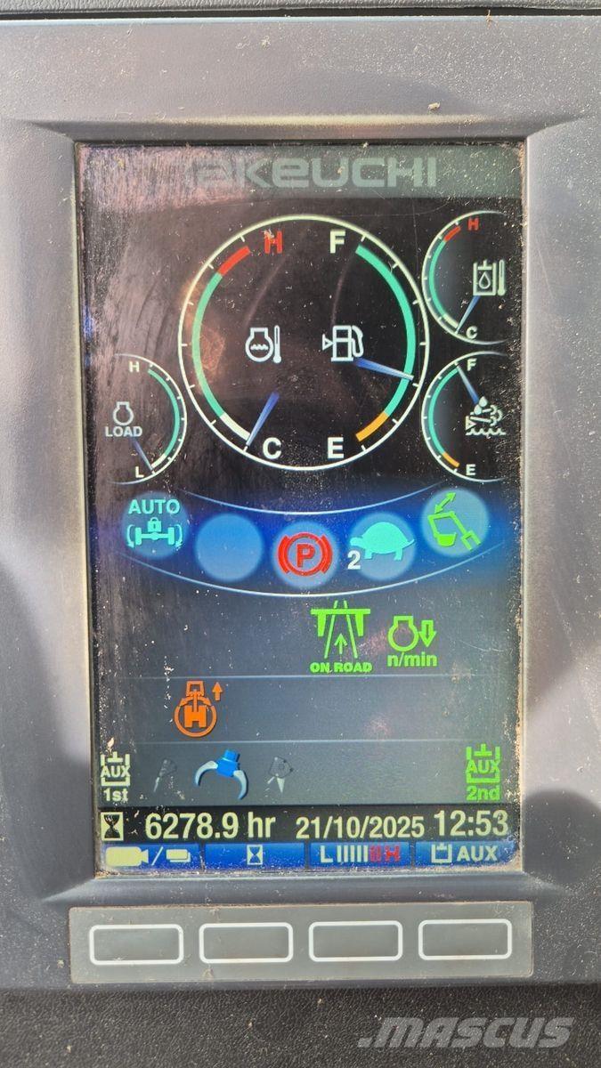 Takeuchi TB 295 W حفارات بعجل