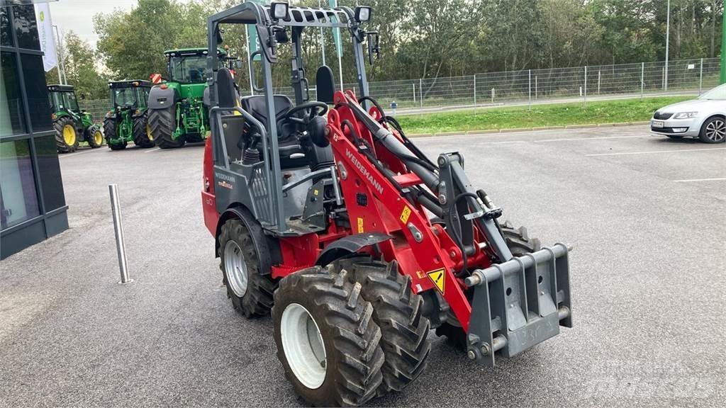 Weidemann 1160 لوادر وحفارات أمامية