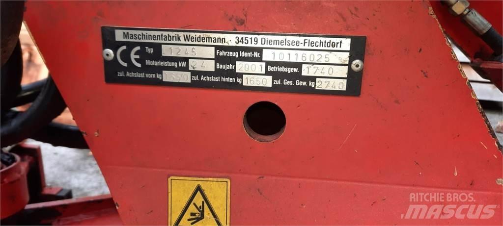 Weidemann 1245 لوادر وحفارات أمامية