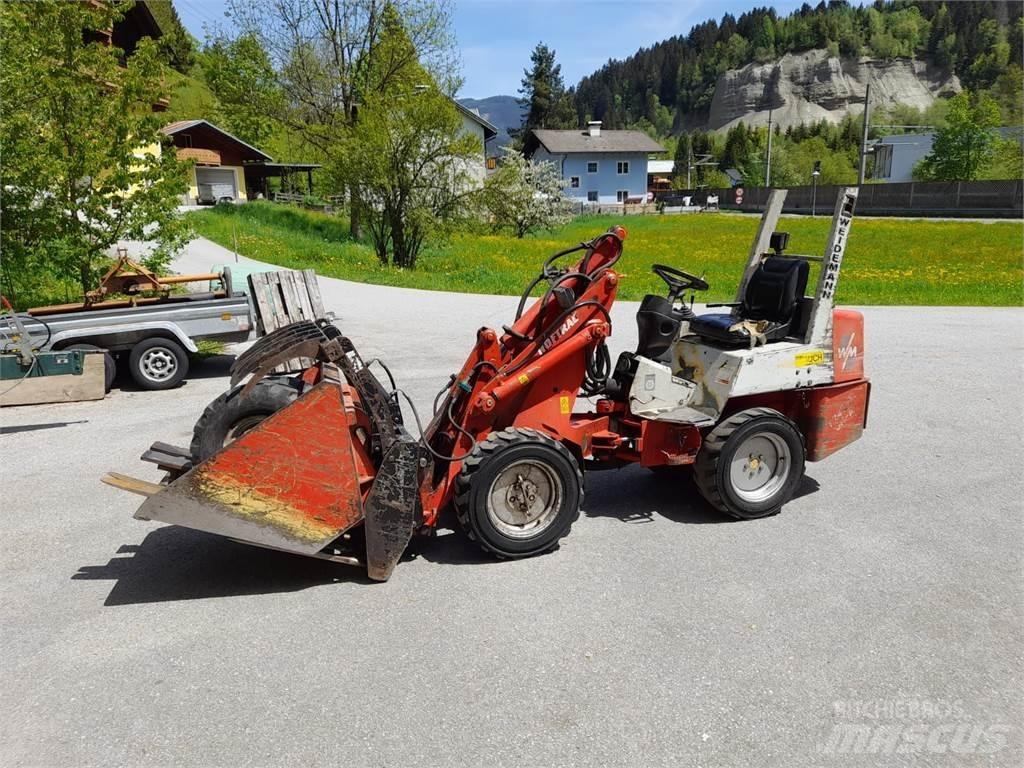 Weidemann 1245 لوادر وحفارات أمامية