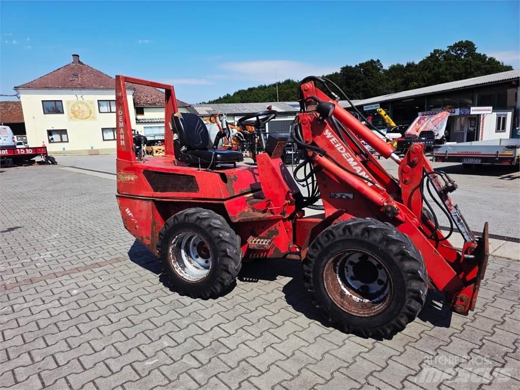 Weidemann 917 D/M لوادر وحفارات أمامية