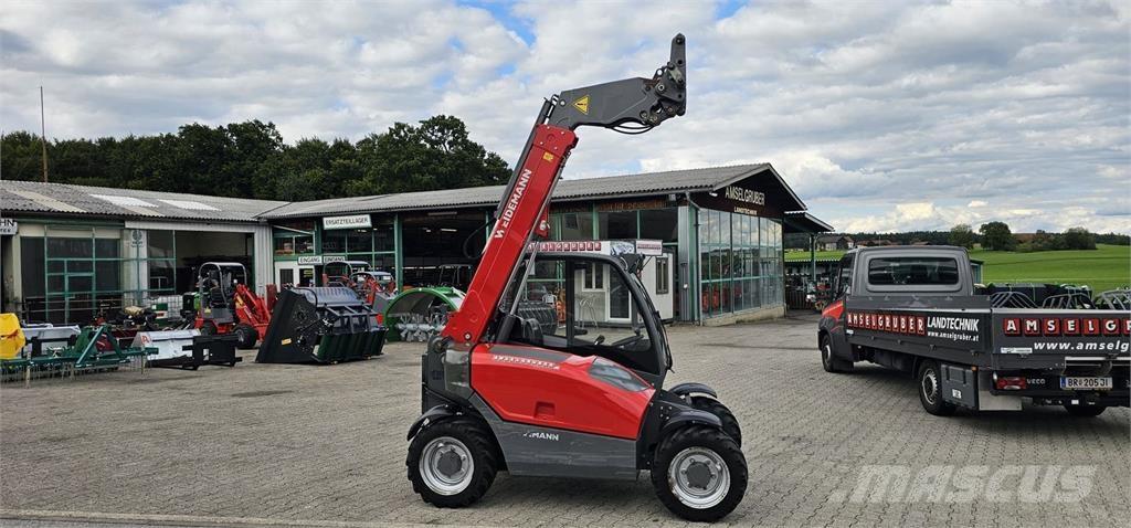 Weidemann T4108 لوادر وحفارات أمامية