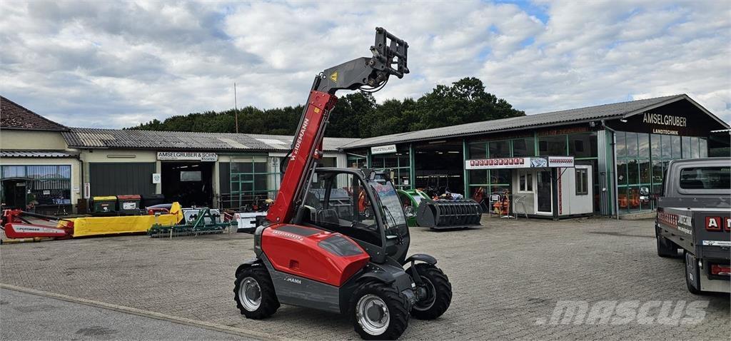 Weidemann T4108 لوادر وحفارات أمامية