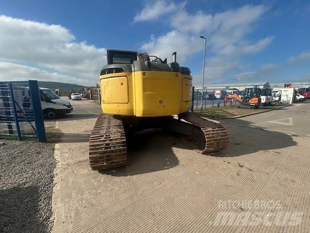 New Holland E235bsr-2 حفارات زحافة