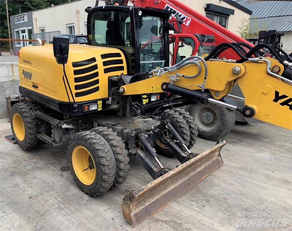 Yanmar B95W حفارات بعجل