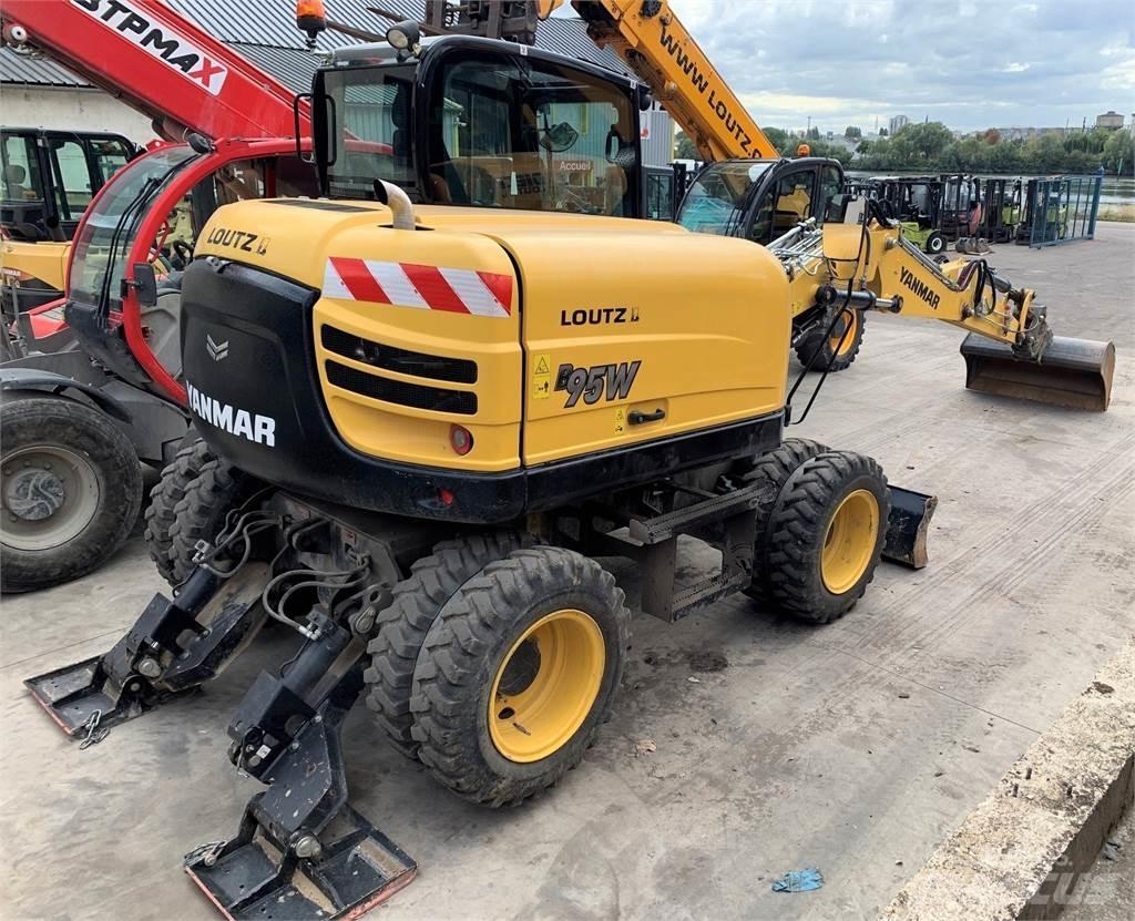 Yanmar B95W حفارات بعجل