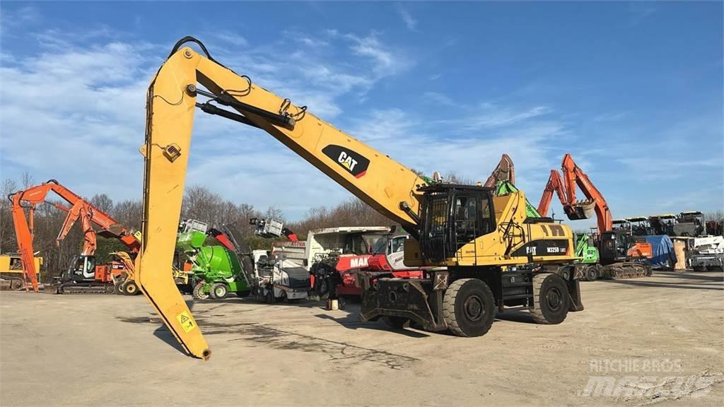 CAT M325D 4X4 حفارات بعجل