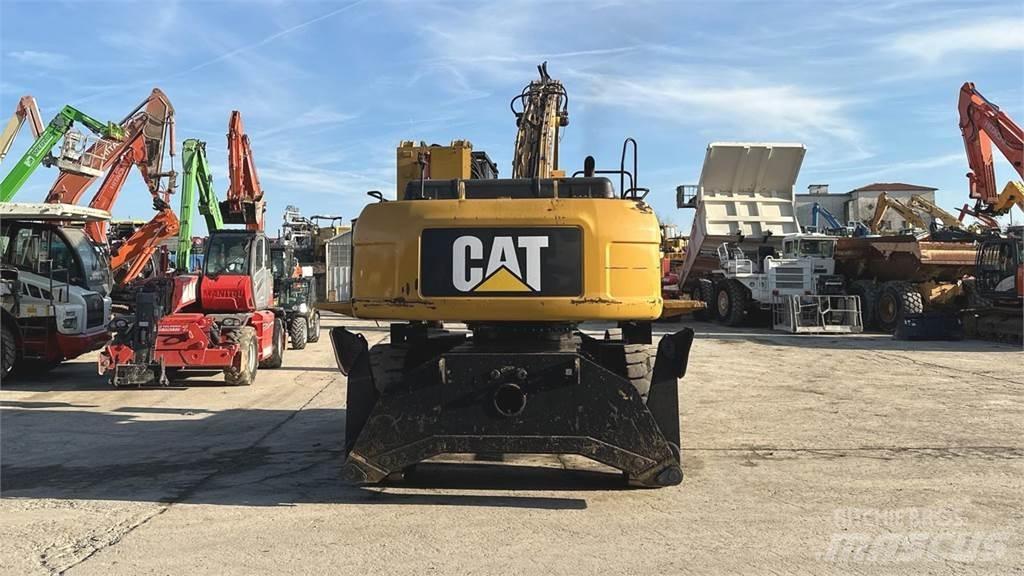CAT M325D 4X4 حفارات بعجل