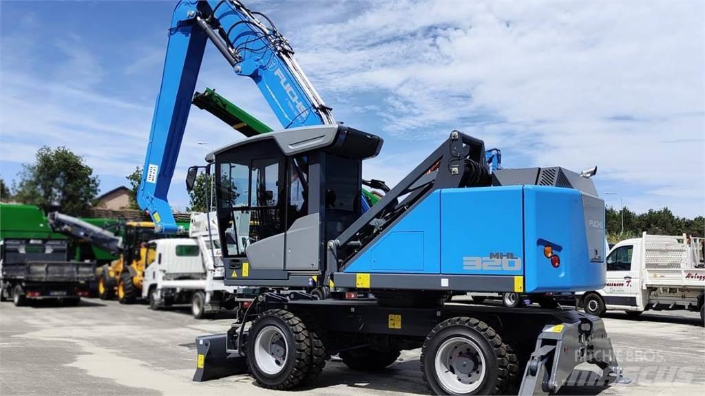 Fuchs MHL 320 حفارات بعجل