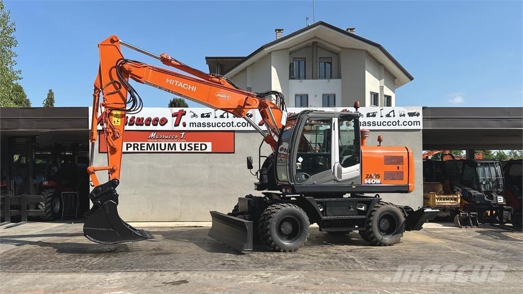 Hitachi ZX140WT-3 حفارات بعجل