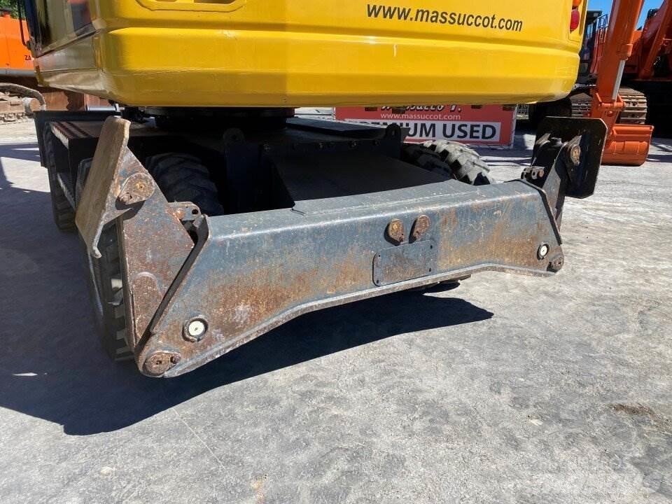 Komatsu PW200 7K حفارات بعجل