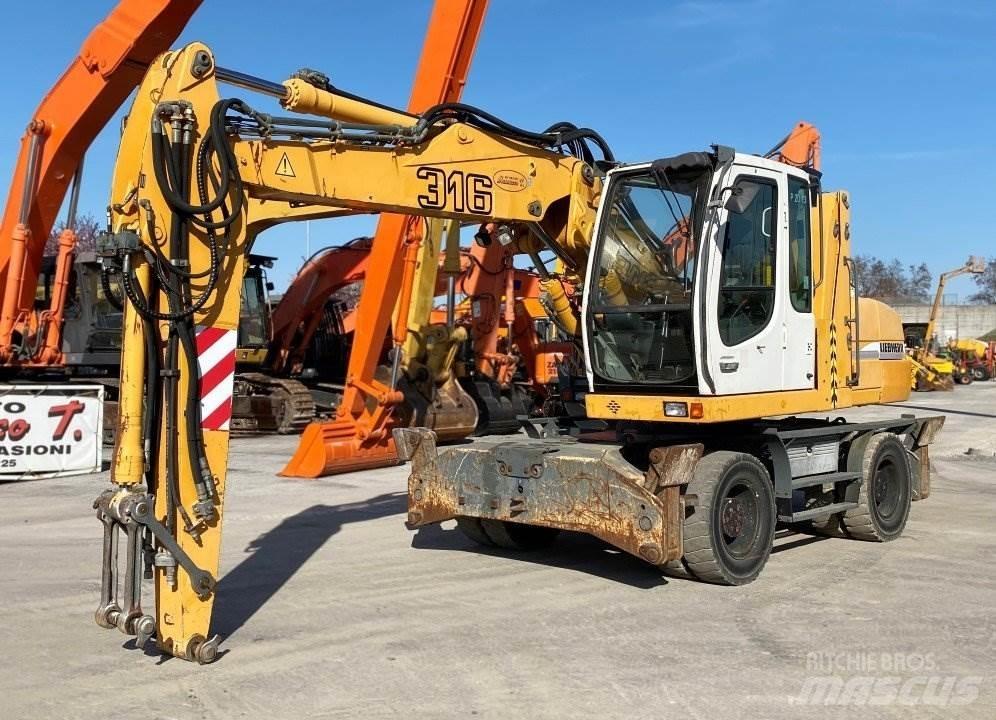 Liebherr A316 حفارات بعجل