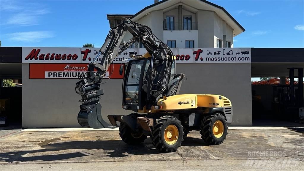 Mecalac 10MSX 4X4 حفارات بعجل